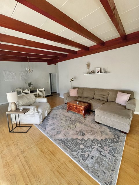 a living room with two couches and a coffee table